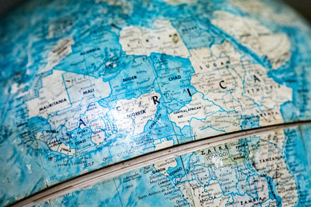 africa on old terrestrial globe detail close upの写真素材