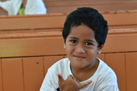 AITUTAKI, COOK ISLAND - AUGUST, 27 2017 - Local people at the christian mass wearing traditional colorful polynesian dressのeditorial素材