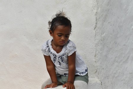 AITUTAKI, COOK ISLAND - AUGUST, 27 2017 - Local people at the christian mass wearing traditional colorful polynesian dressのeditorial素材