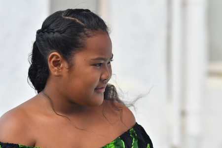AITUTAKI, COOK ISLAND - AUGUST, 27 2017 - Local people at the christian mass wearing traditional colorful polynesian dressのeditorial素材