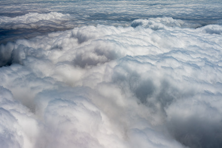 clouds in the sky from airplane cockpitの写真素材