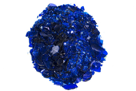 Broken glass many color pieces detail on whiteの写真素材