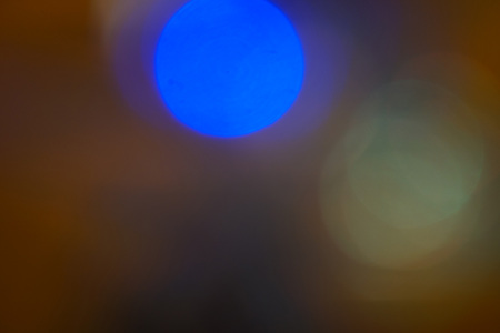 blur lights christmas background on blackの写真素材