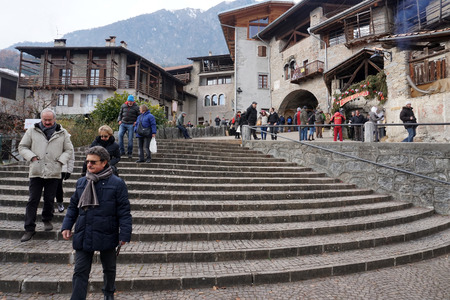 RANGO, ITALY - DECEMBER 1, 2017 - People buying at the shops of traditional christmas market in the beautiful medieval villageのeditorial素材