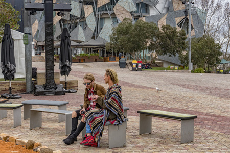 MELBOURNE, AUSTRALIA - AUGUST 15 2017 - Federation Square the hearth of the town with modern lines and bulding, adjacent to Flinders Street station.のeditorial素材