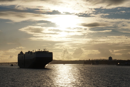 Ship prow bow silhouette at sunset Auckland harbor operationの写真素材