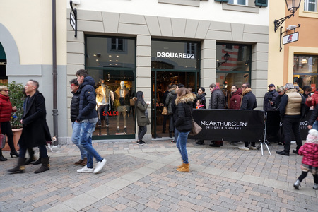 SERRAVALLE SCRIVIA, ITALY - JANUARY 15 2018 - Lot of people buying fashion items at the beginning of designer outlet winter Sale seasonのeditorial素材