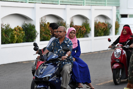 MALE, MALDIVES - FEBRUARY 17 2018 - People in the street before evening pray time in male maldives capital small island town heavy traffic jamのeditorial素材