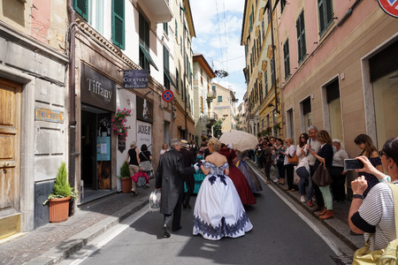 GENOA, ITALY - MAY 5 2018 - 19 century dress parade for Euroflora Exhibit in Nervi parks the most important among European floralies thriugh historic villas and housesのeditorial素材