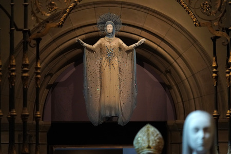 NEW YORK, USA - MAY 27 2018 - Heavenly Bodies: Fashion and the Catholic Imagination at Met museum features a dialogue between fashion and medieval artのeditorial素材