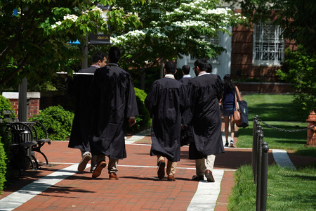 BALTIMORE, USA - MAY 21 2018- it is graduation day at Maryland well famous John Hopkins university. Students celebrate trowing hats in the air.のeditorial素材