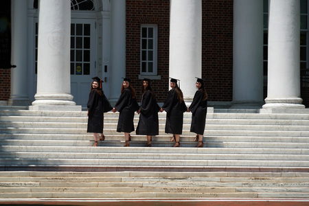 BALTIMORE, USA - MAY 21 2018- it is graduation day at Maryland well famous John Hopkins university. Students celebrate trowing hats in the air.のeditorial素材