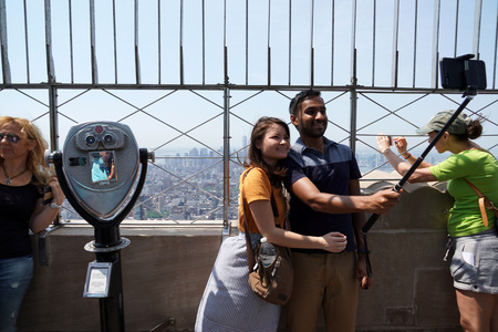 NEW YORK, USA - MAY 25 2018 - selfie in Empire state building crowded of tourists.
It is 381 meters (1,250 feet) tall and has 102 floors is one of the most famous landmarks in the US.のeditorial素材