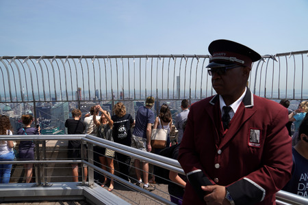 NEW YORK, USA - MAY 25 2018 - Empire state building crowded of tourists.
It is 381 meters (1,250...