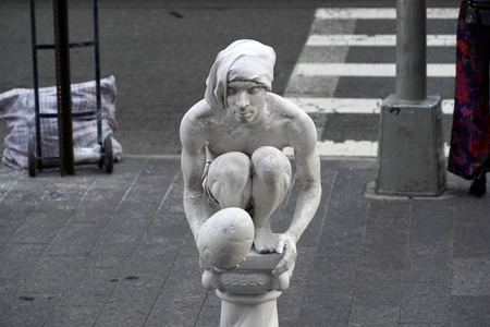 NEW YORK, USA - MAY 27 2018 - living statue performer outside Met Metropolitan Museumのeditorial素材