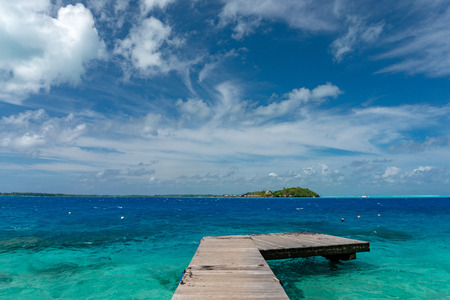jetty lagoon of bora bora island in french polynesia landscapeの写真素材