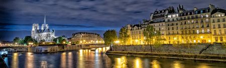 paris notre dame dome cathedral at nightの写真素材