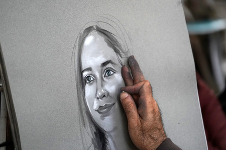 PARIS, FRANCE - OCTOBER 6 2018 - Artist painting and drawing portraits on sunny sunday day in Montmartre Place du Tertre famous artist retreatのeditorial素材