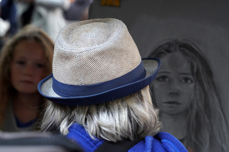PARIS, FRANCE - OCTOBER 6 2018 - Artist painting and drawing portraits on sunny sunday day in Montmartre Place du Tertre famous artist retreatのeditorial素材
