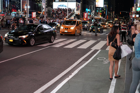 NEW YORK, USA - MAY 25 2018 - Times Square is a major commercial intersection, tourist destination,...