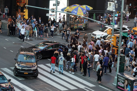 NEW YORK, USA - MAY 25 2018 - Times Square is a major commercial intersection, tourist destination,...