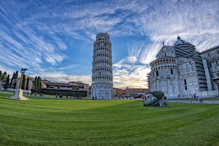 PISA, ITALY - SEPTEMBER 26 2017 - Tourist taking pictures while pushing and holding famous leaning tower in piazza dei miracoliのeditorial素材