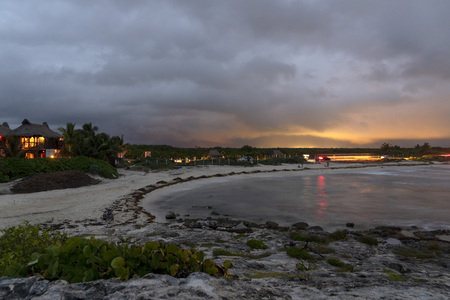 sunset in tulum mexico beachの写真素材