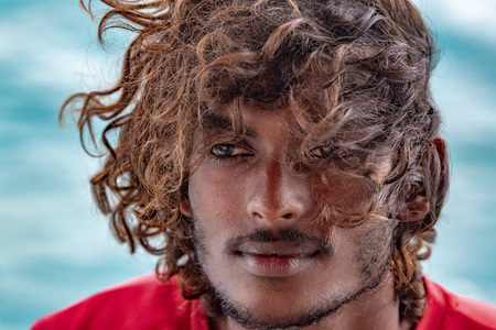 Young maldives man portrait looking at you
