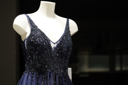 gala dress on mannequin isolated on blackの写真素材