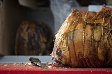 italian pork oven cooked porchettaの写真素材