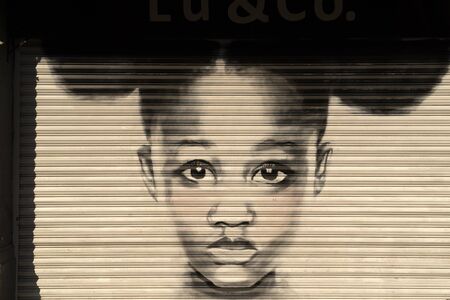 MEXICO CITY, MEXICO - JANUARY 30 2019 - All the shops rolli down gates have graffiti in 20 november business street. Art is all over the capital, and is especially visible before the stores openのeditorial素材