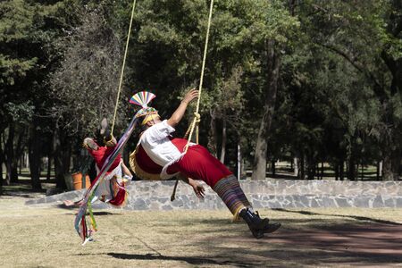 MEXICO CITY, MEXICO - JANUARY 30 2019 - The dance of flyers los voladores is an ancient Mesoamerican ritual still performed today to ask the gods to end a severe drought.のeditorial素材