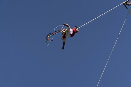 MEXICO CITY, MEXICO - JANUARY 30 2019 - The dance of flyers los voladores is an ancient Mesoamerican ritual still performed today to ask the gods to end a severe drought.のeditorial素材
