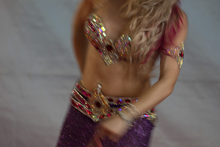 Oriental belly dancer beutiful move detail