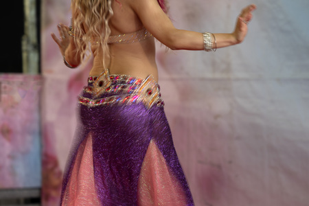 Oriental belly dancer beutiful move detailの写真素材