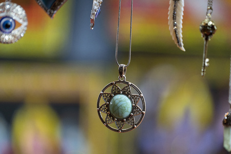 many stone pendant at the market detailの写真素材