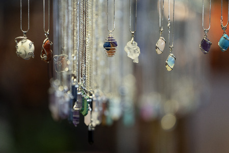 many stone pendant at the market detailの写真素材