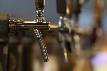 beer disenser many of at the pub bar detail