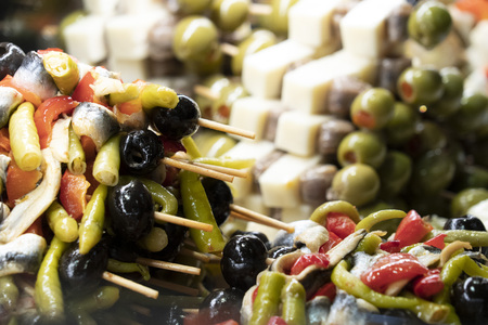 olive skewers at the market detailの写真素材