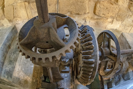 Old giant iron and wood gear detail
