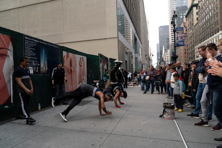 NEW YORK, USA - MAY 7 2019 -  young Break dancers show  in 5th avenue