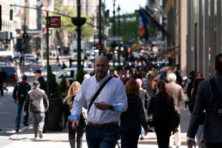 NEW YORK, USA - MAY 6 2019 - Regularly referred to as the most expensive street in the world, Nyc 5th Avenue runs down the center of Midtown Manhattanのeditorial素材