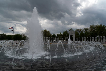 WASHINGTON DC, USA - APRIL 27 2019 - Many tourist at World War II Memorial monument and fountainのeditorial素材