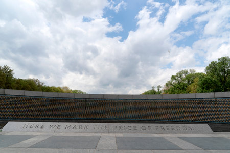 WASHINGTON DC, USA - APRIL 27 2019 - Many tourist at World War II Memorial monument and fountain