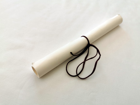 Parchment scroll vellum on a table detail