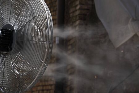 refresher fan with cold water spray detailの写真素材