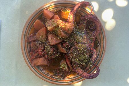 octopus with potato and pistachio traditional sicily dish