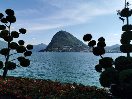 LUGANO, SWITZERLAND - JUNE 23 2019 - Lugano view cityscape from the lake full of people on sunday summer sunny dayのeditorial素材