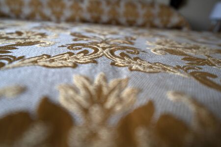 medieval fabric close up detail texture background  gold and whiteの写真素材