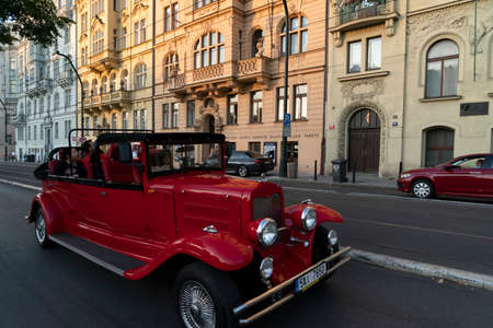 PRAGUE, CZECH REPUBLIC - JULY 15 2019 - Old style cars in Medieval town famous landmarks of the city full of tourist in summer timeのeditorial素材